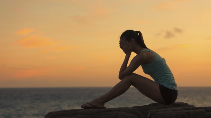 Young woman feeling sad